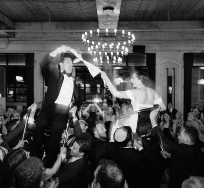 wedding couple during the hora at the Switch House by Cescaphe in Philadelphia