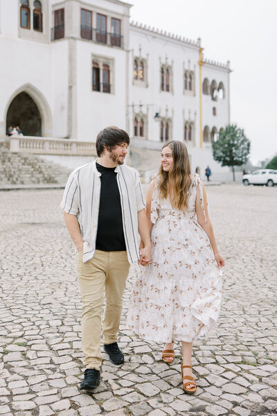 Liana Huot is captured walking hand-in-hand with her husband in Sintra, Portugal for their destination wedding engagement photoshoot.