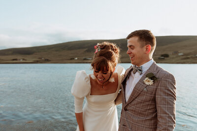 bride and groom laugh
