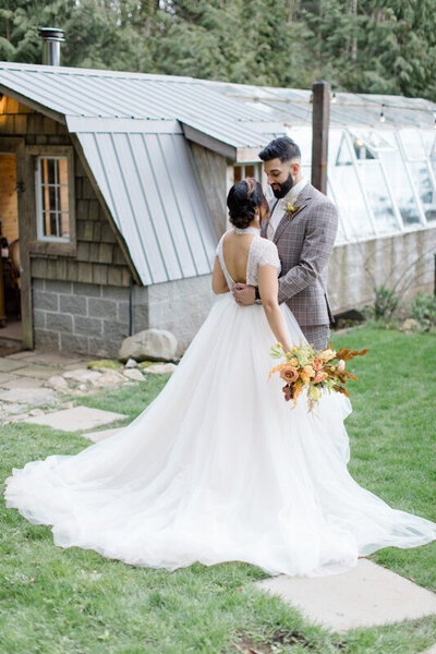 Whimsical greenhouse wedding with butterscotch and blue palette at The Greenhouse, a unique garden wedding venue in Abbotsford, BC, featured on the Brontë Bride Blog.