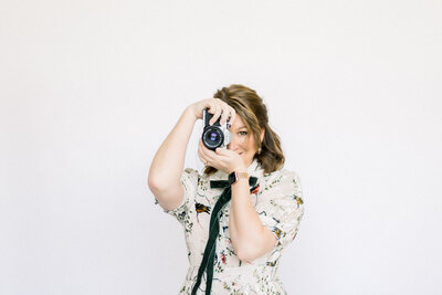 Portrait of Tiffany Longeway, the acclaimed photographer specializing in luxury weddings. Her headshot reflects the artistic vision and dedication she brings to capturing love stories with elegance and creativity.