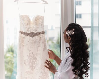 Bride admiring wedding dress, Destination Wedding at The Palms Hotel in Miami, FL