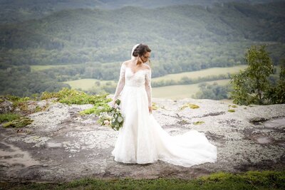 Bride poses for portraits with gorgeous Carolina landscape