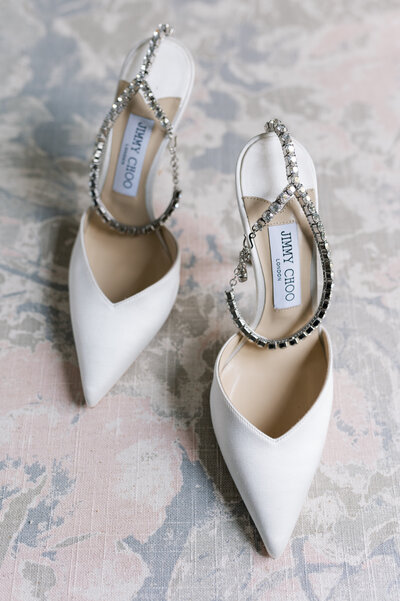 editorial wedding day detail photo of bridal shoes