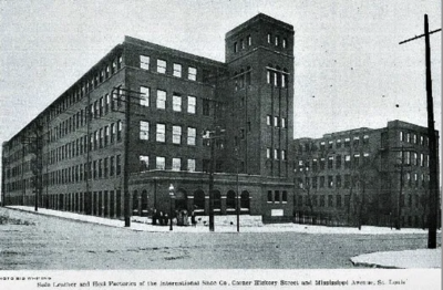 A vintage black and white photo of the old Shoe Factory at Lafayette Square.