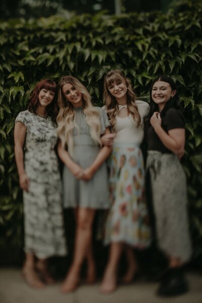 photo of four women smiling