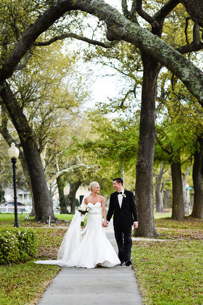 Couple under the oaks at their Mississippi Gulf Coast wedding