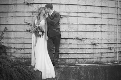 Bride and groom sharing a moment together at the Historic Stonebrook Farm