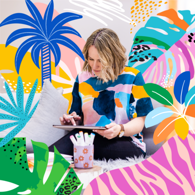 Crystal Oliver drawing on an ipad with tropical graphics