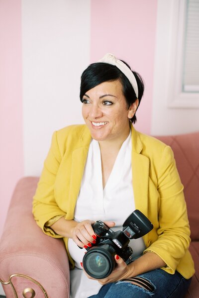 Dolly DeLong of Dolly DeLong Photography and Education branding headshots at the Nashville Pinky House in East Nashville