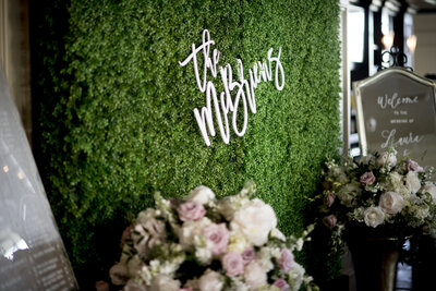Photo of the Boxwood Greenery Wall that you can rent for your event/wedding from Unique Melody Events & Design (New England Wedding and Event Planners)