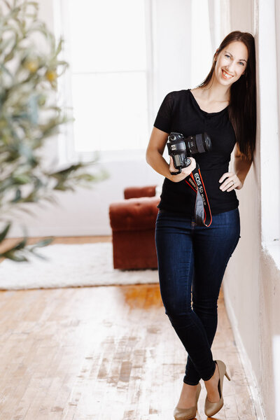 Chelsey standing with Canon 5D Mark iii at Sunday Studio with Canon 5D Mark iii at Sunday Studio