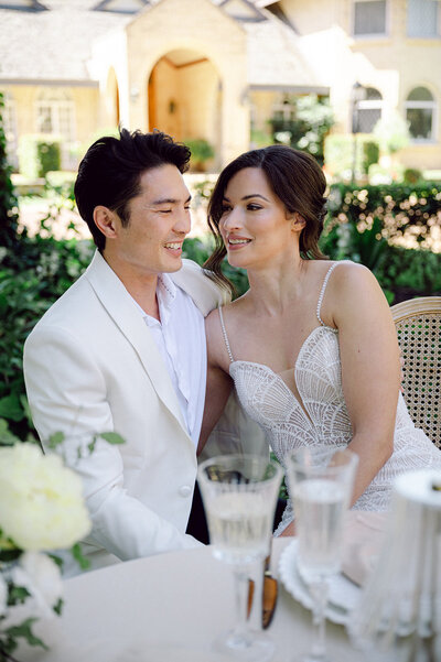 Bride and groom walk up memorial steps at their DC wedding