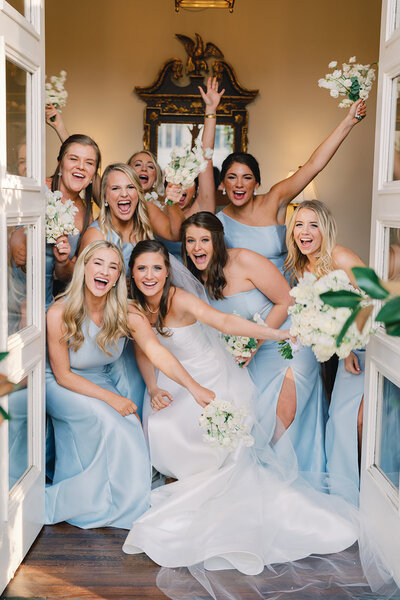 Bridesmaids cheering at a wedding in downtown Savannah