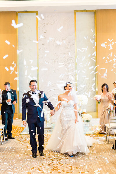 just married confetti walk down the aisle