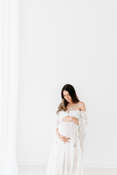 Beautiful pregnant mother on her maternity photoshoot