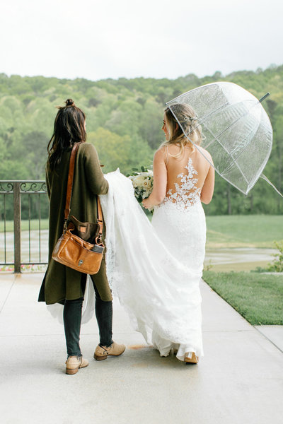 bride holding umbrella