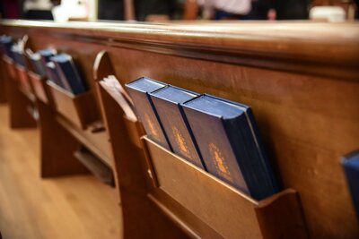 madison crossroads church pews with bible