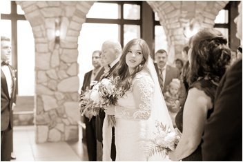 bride looking at mom during ceremony at cliffs glassy chapel