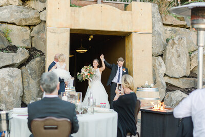 bride and groom enter reception at swiftwater cellars