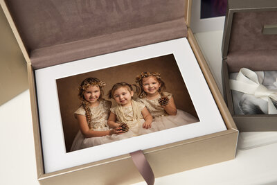 Heirloom box filled with printed photographs
