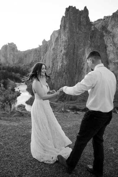 Bride and Groom dancing for their elopement in Smith Rock State Park