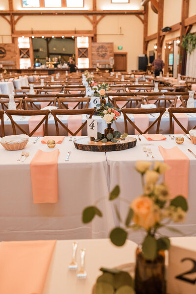a wedding reception table settings at barnwood events, a wedding venue in madison, winconsin.