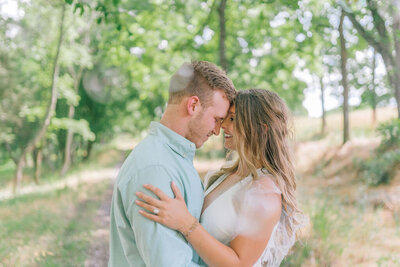 Sacramento Wedding Photographers capture bride and groom embracing during engagements