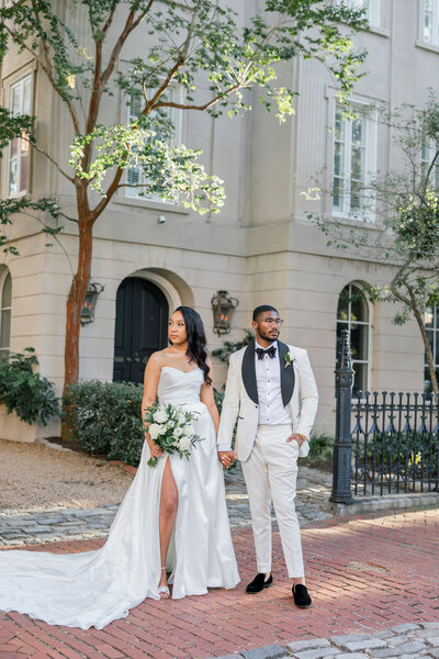 Bride and groom taking wedding day photos