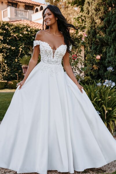Gorgeous beading and exposed bodice boning are the highlights of this strapless, fit and flare gown.
