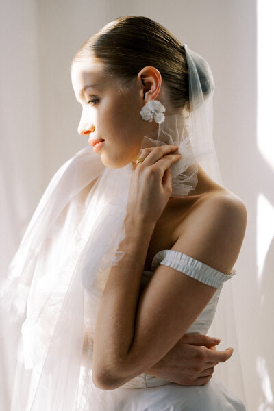 Wedding photograph of a gorgeous bride getting ready on her wedding day