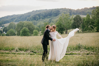 Bride and groom portraits in an open field in Phoenixville, PA.