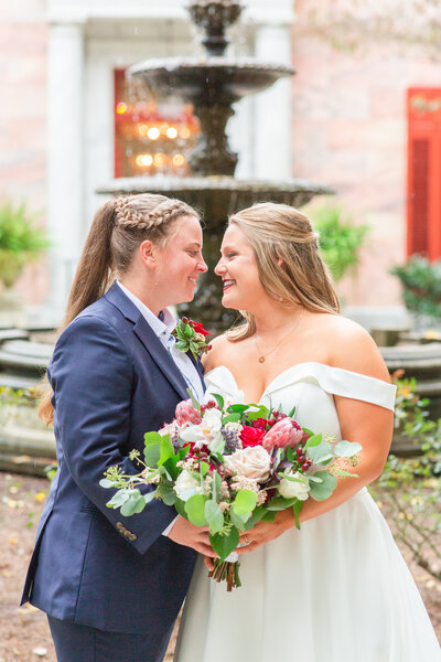 A photo of two brides at their wedding at the Tate House by Atlanta's best wedding photographer Jennifer Marie Studios.