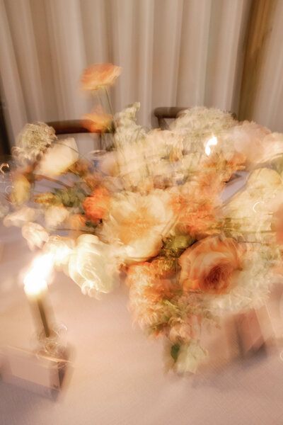 Close-up detail of bride’s lace wedding dress in natural lighting