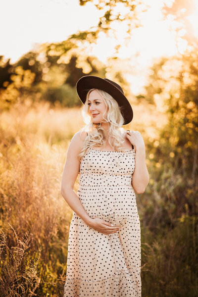 Flower Mound upscale maternity photographer capturing emotion during motherhood.