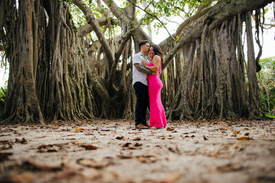 Cute Couple in front of giant tree
