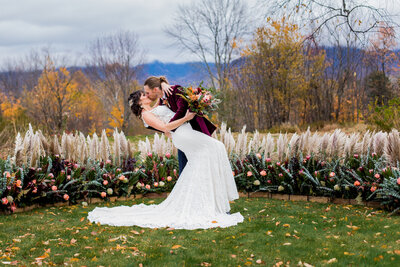 NH bride styled shoot with a ground arbor and airy pampas grass