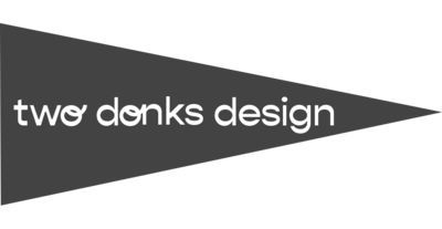 Logo for Two Donks Design, black banner white white lettering