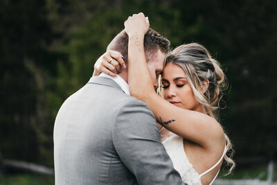 Couple sharing an intimate moment during their Yellowstone elopement.