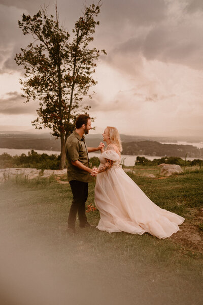 couple getting married under a tree