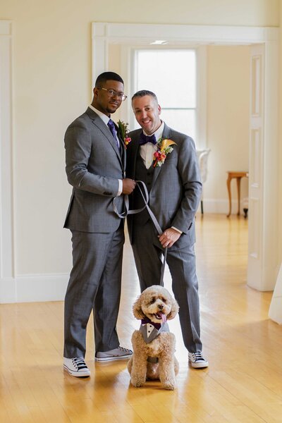 Grooms Pose With Dog
