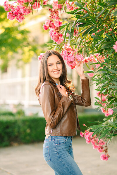 Pleasanton, CA senior portrait with pink flowers by Bay Area Senior Photographer Kristen Hazelton