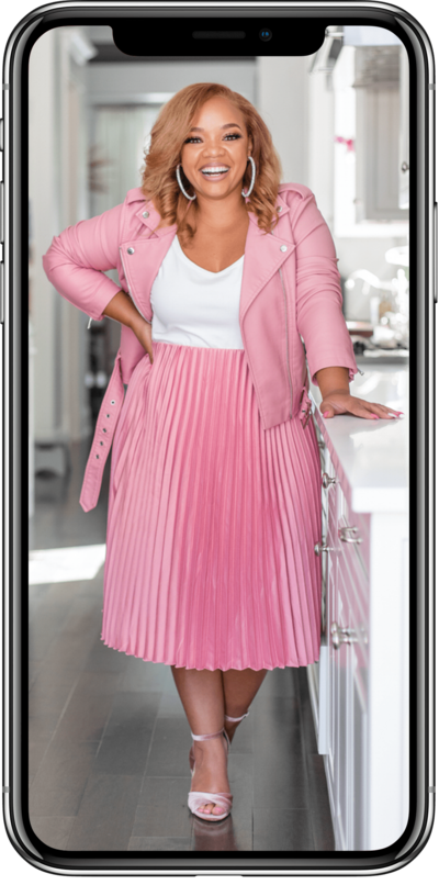 woman in a pink jacket and pink skirt smiling inside of an iphone