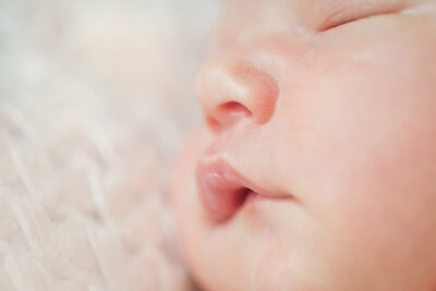 Macro shot of a newborns lips and