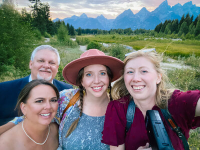 Grand Teton wedding photographer captures selfie with wedding couple after Jackson Hole wedding