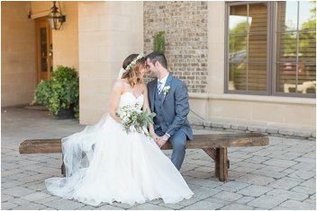 bride and groom in front of bleckley inn after wedding