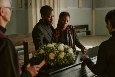 family-bemoaning-at-funeral-2025-02-11-18-59-41-utc