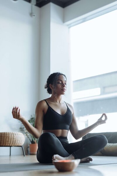 Restorative yoga in Puerto Escondido uses supported poses and deep relaxation techniques to activate the parasympathetic nervous system, aiding recovery, reducing anxiety, and promoting healing—ideal for injury recovery and burnout through EnForma.