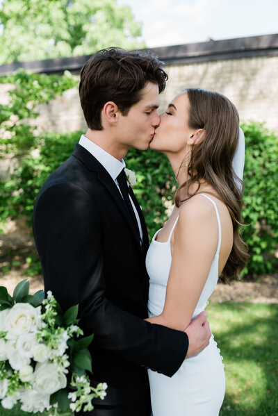 Bride and groom kissing in Minnetonka