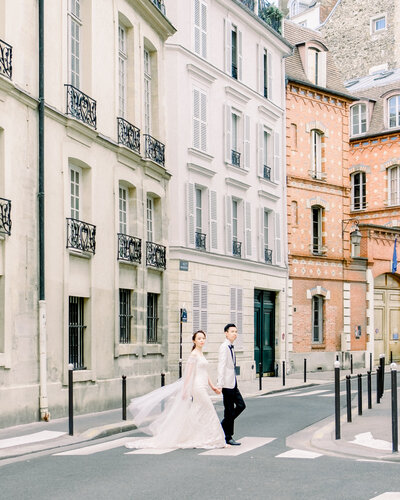 Paris Wedding, couple strolls along  Rue Chanoinesse